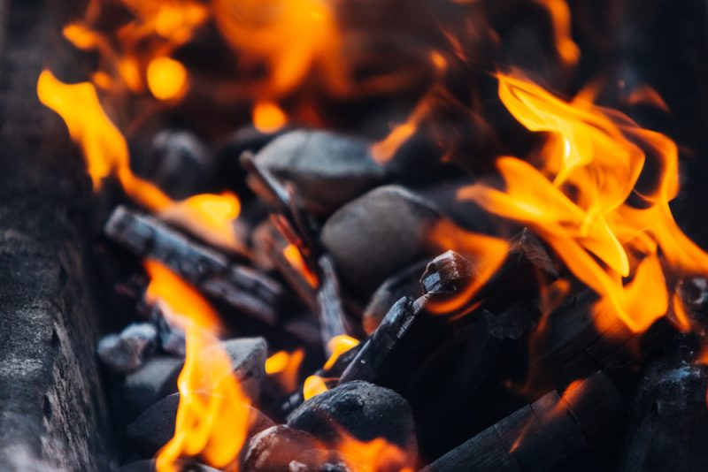 Charcoal burning in a grill